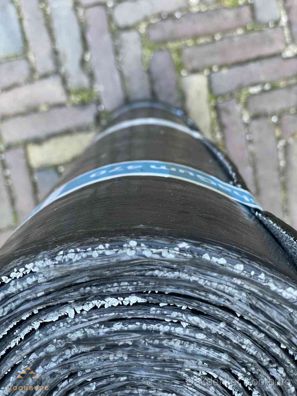 Rol bitumen dakleer met leislag voor plat dak in Voorburg